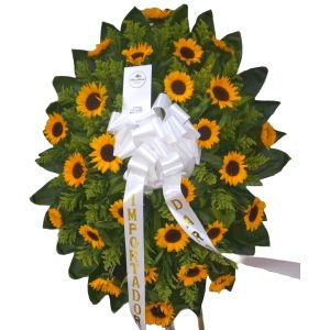 arreglo-floral-funebre-en-tripode-con-girasoles arreglos florales funebres Cali con base